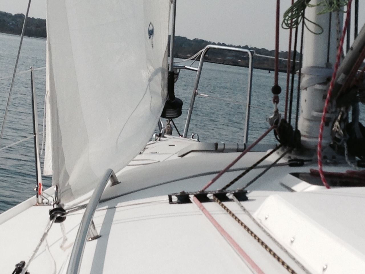 Low friction ring pulling jib towards grab rail